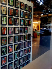Image of framed works in a uniform grid.
